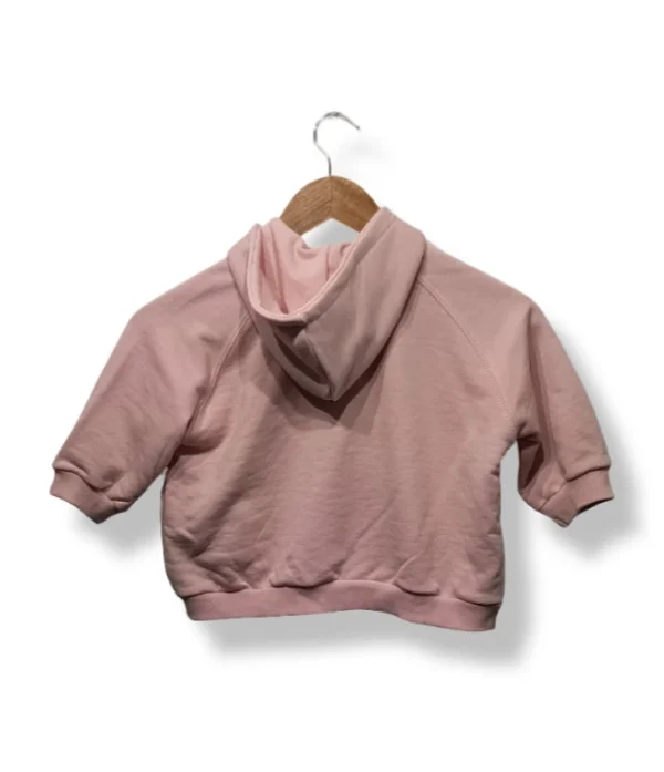 pixelcut-export-1754063412640 Polerón corto rosado Zara niña, manga corta con gorro