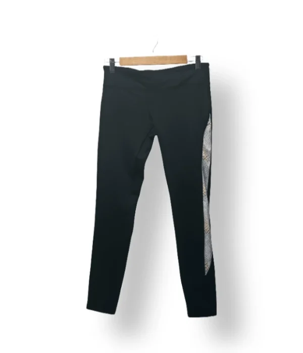 Calza negra con franja animal print Forever 21 – Talla S